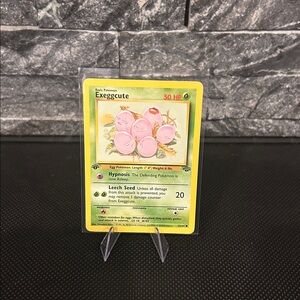 Pokemon Exeggcute 1st Edition 52/64 Vintage Card from the Jungle Set (1999) M/NM